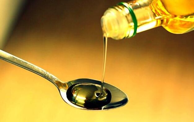 Cleansing a child's body from worms with castor or linseed oil